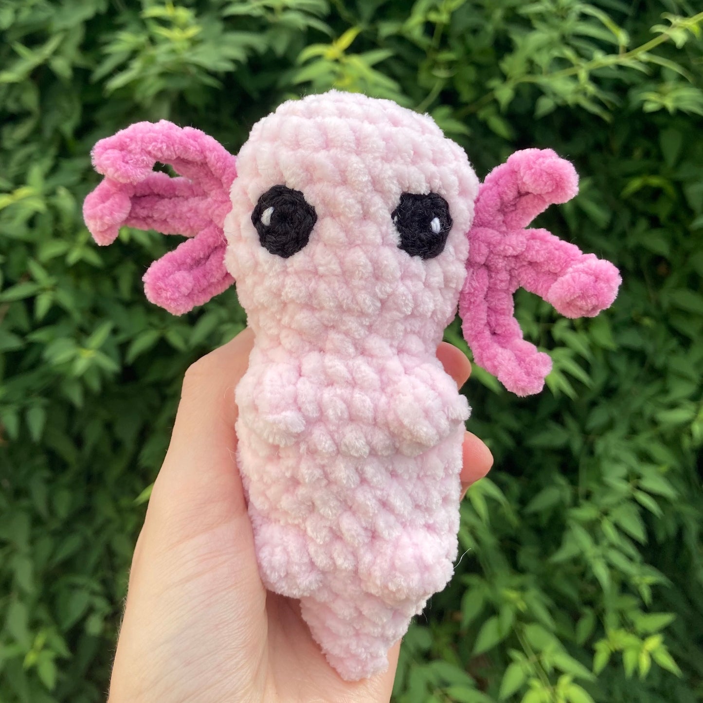 Handmade baby pink axolotl crochet plush