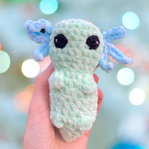 Handmade axolotl crochet plush toy in green